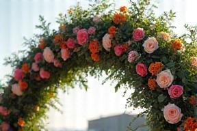 Beautiful floral arch decoration at a wedding ceremony